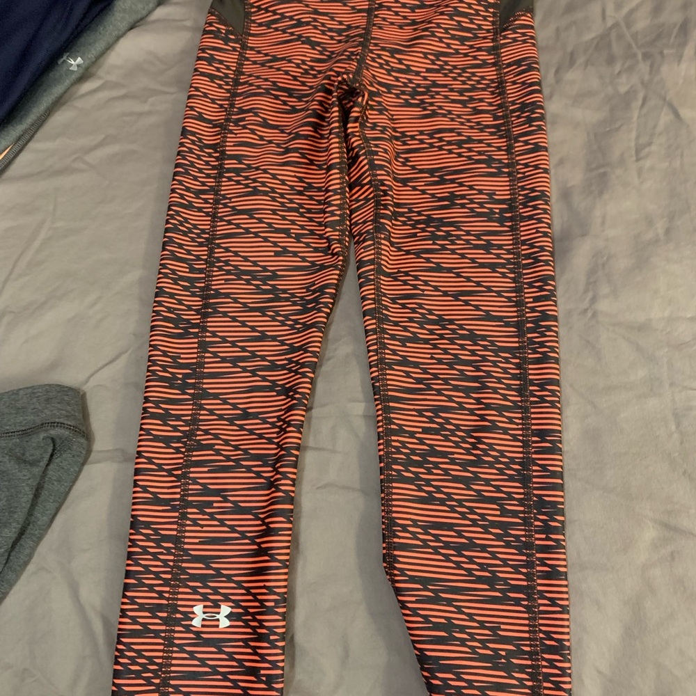 Under armor exercise leggings.  Orange and black. Brand new!